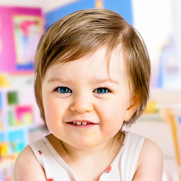 A smiling toddler, radiating joy